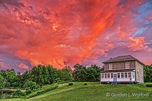 Fiery Sunset Clouds_34877.jpg - Lockmaster's House photographed along the Rideau Canal Waterway at Kilmarnock, Ontario, Canada.